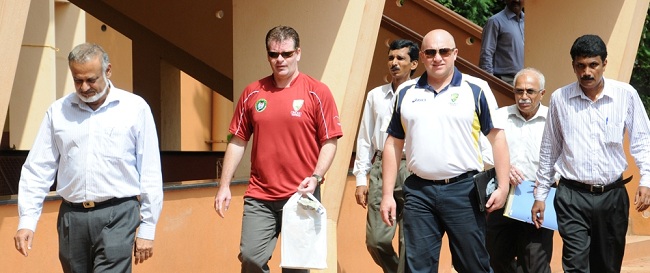 Former Test Cricketer Brijesh Patel, Coach Manager of CA Matthew Betsey and CEO Martin Gleeson enters at St. Aloysius Centenary Ground, Mangalore